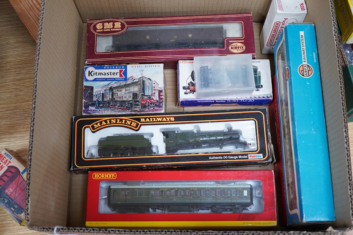 A quantity of 00 gauge railway by various makes, comprising; nine locomotives by Tri-ang, Hornby Dublo, etc. (one missing tender), sixteen maroon bogie coaches and eighteen freight wagons